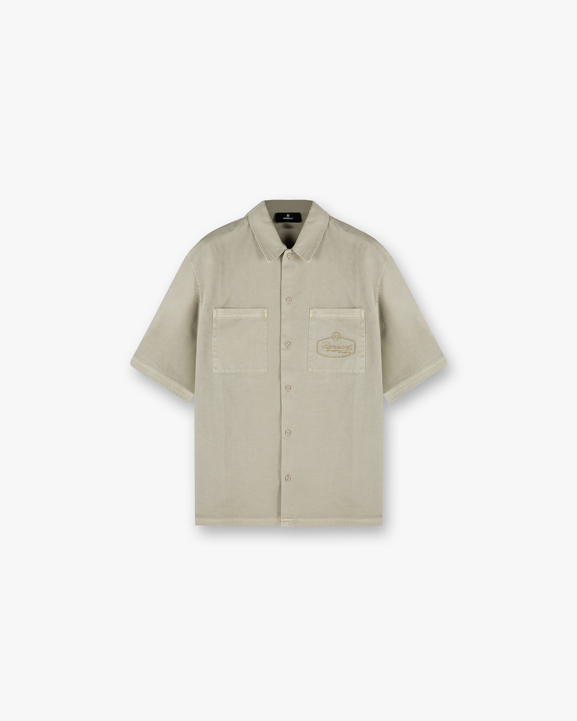 Front product image of a mens beige shirt on a plain white background | Short Sleeve Cotton Overshirt in Beige | Jersey cotton shirt | SS25 Shirts | Represent Clo
