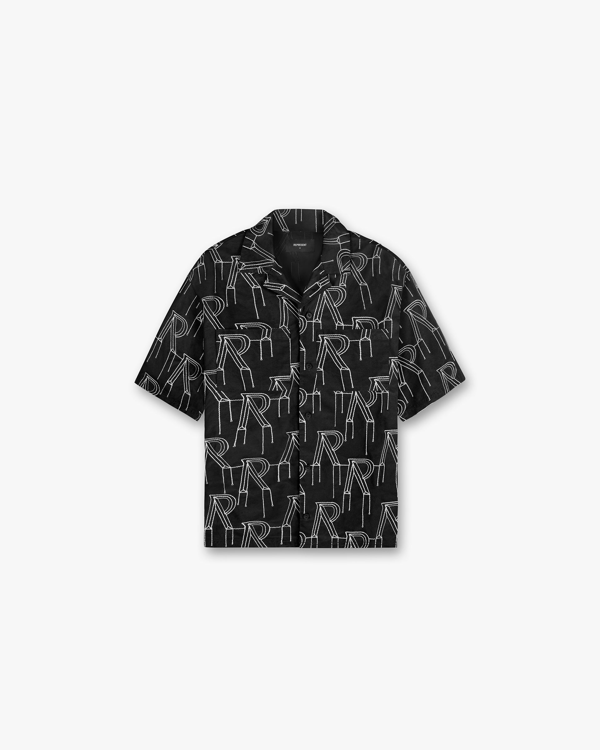 Front product image of a mens black overshirt on a plain white background | Embroidered Initial Overshirt in Black | Oversized shirt with chain stitch embroidery and revere collar | SS24 Shirts | Represent Clo