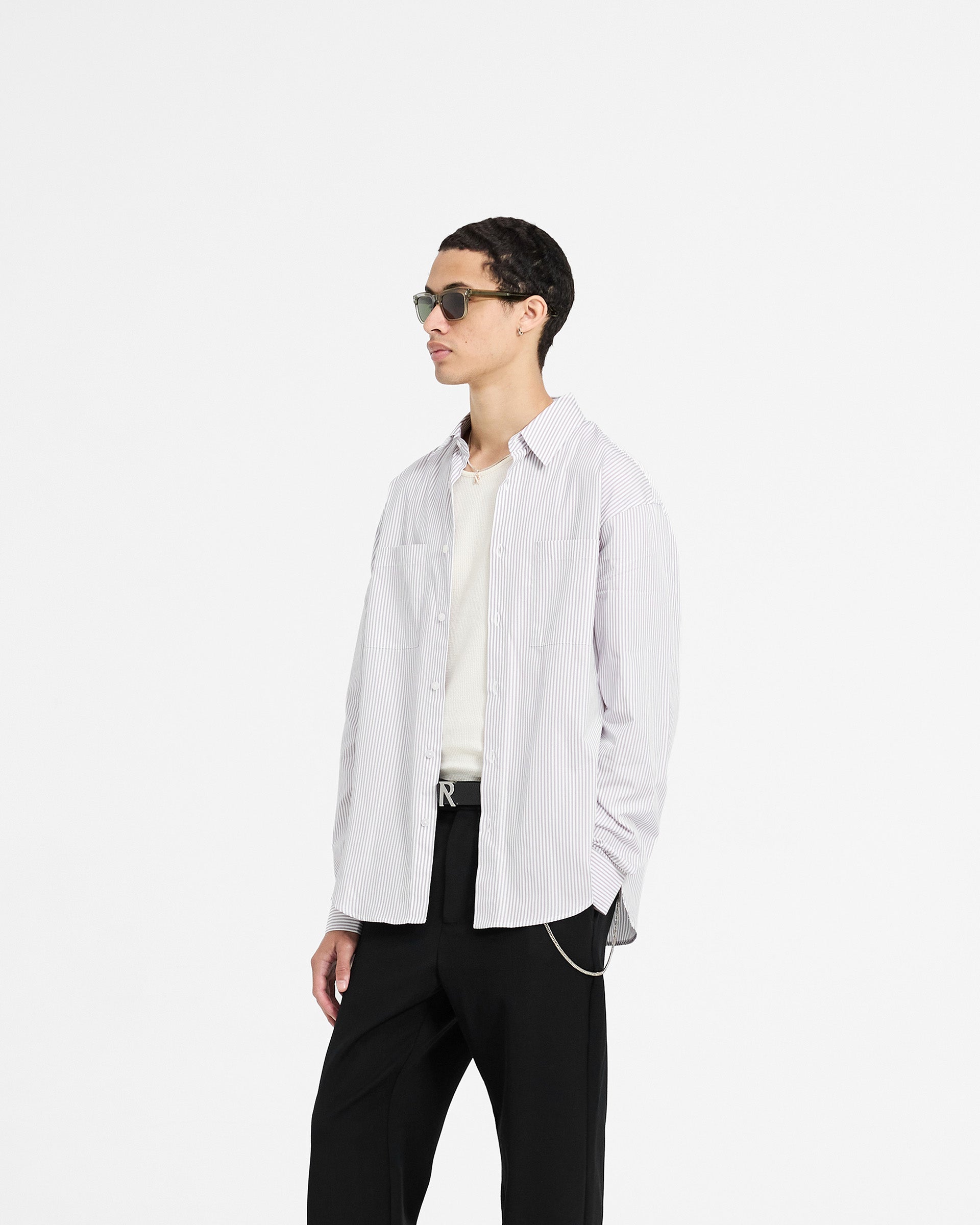 Back product image of a mens grey pinstripe shirt on a plain white background | Long Sleeve Pinstripe Shirt in Grey | Slightly oversized fit shirt with curved hem | SC24 Shirts | Represent Clo