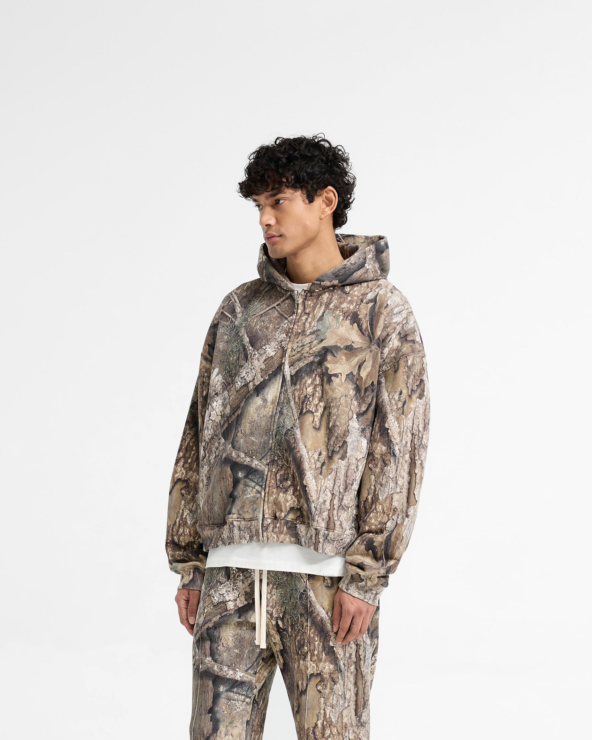Back product image of a mens camo hoodie on a plain white background | Realtree Zip Up Camo Boxy Hoodie in Camo | Camo hoodie with boxy fit and double-ended zip closure | SS25 Hoodies | Represent Clo