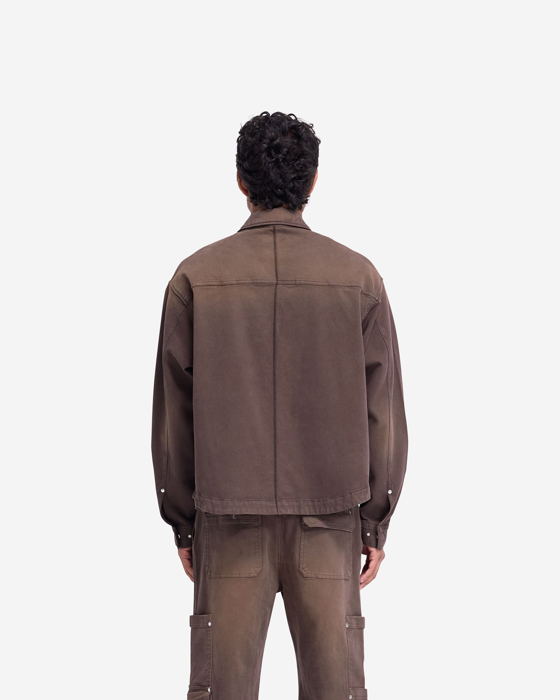 Man wearing a cedar overshirt on a plain white background | Workshop Shirt in Cedar | Everyday overshirt with flap and patch pockets | FW24 Shirts | Represent Clo